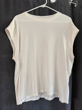 American Eagle Outfitters Ribbed Sleeveless Crewneck Top in Cream